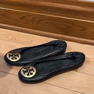 Tory Burch Black Flats with Gold Emblem